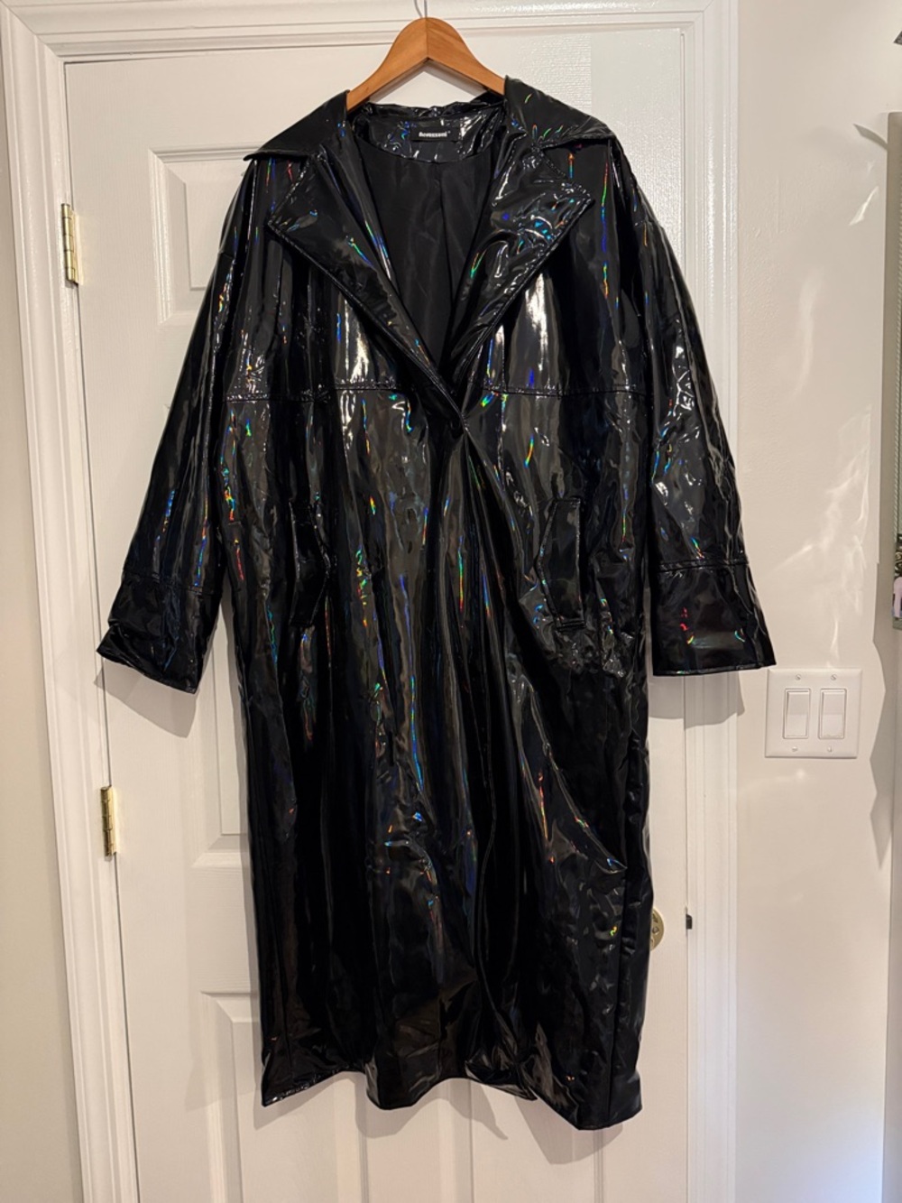 Glossy Black Patent Trench Coat with Subtle Iridescent Sheen